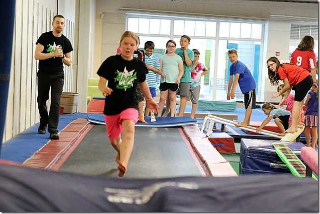 CNY Gym Centre birthday party — kids on the gym floor with instructors