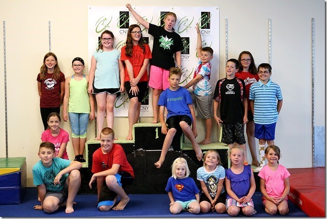 CNY Gym Centre birthday party — kids on the gym floor with instructors